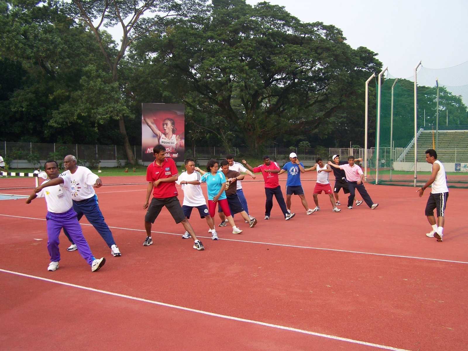 Outdoor track coaching practice with adult learners